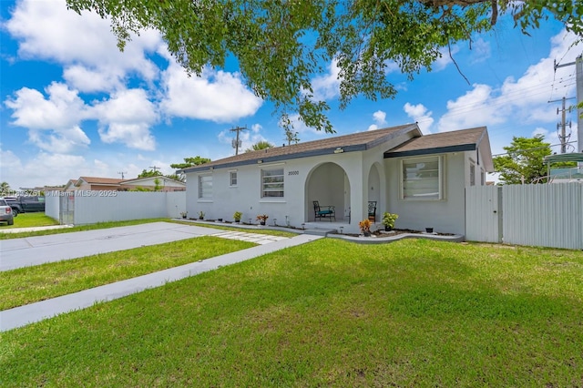 20000 SW 114th Ave, Miami, FL 33189 - ranch-style house with stucco siding and a gate