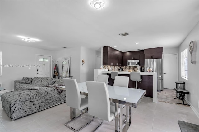 20000 SW 114th Ave, Miami, FL 33189 - dining space featuring light tile patterned floors and baseboards