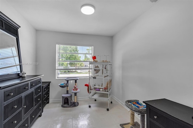20000 SW 114th Ave, Miami, FL 33189 - miscellaneous room featuring light tile patterned floors and baseboards