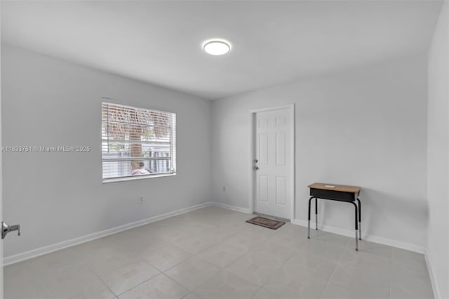 20000 SW 114th Ave, Miami, FL 33189 - empty room with light tile patterned flooring and baseboards