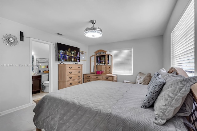 20000 SW 114th Ave, Miami, FL 33189 - bedroom featuring ensuite bathroom and baseboards