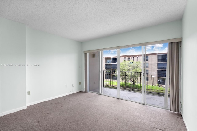 8895 Fontainebleau Blvd Unit 301, Miami, FL 33172 - spare room with carpet flooring and a textured ceiling