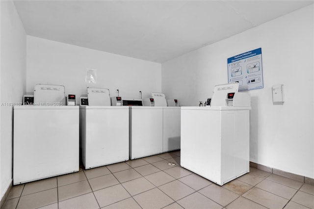 8895 Fontainebleau Blvd Unit 301, Miami, FL 33172 - community laundry room with washing machine and dryer and light tile patterned floors