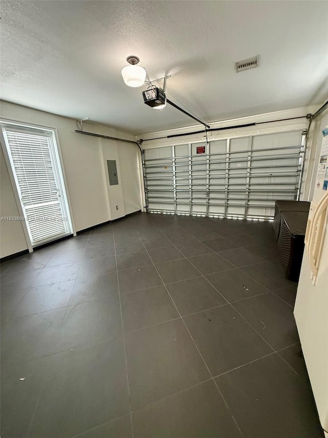 14601 SW 30th St, Miami, FL 33175 - garage with a garage door opener and electric panel