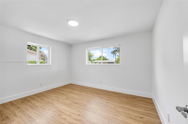 2050 NW 30th Ave, Fort Lauderdale, FL 33311 - unfurnished room with plenty of natural light and light wood-style flooring