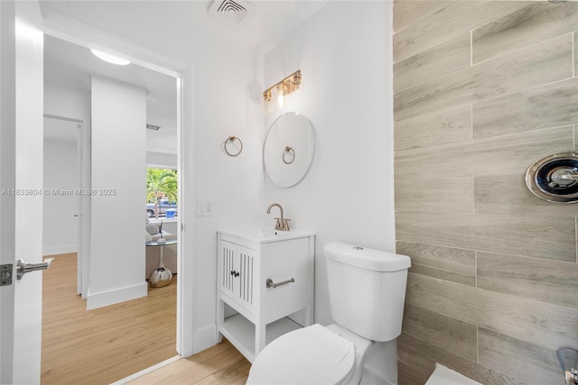2050 NW 30th Ave, Fort Lauderdale, FL 33311 - bathroom featuring vanity and wood finished floors