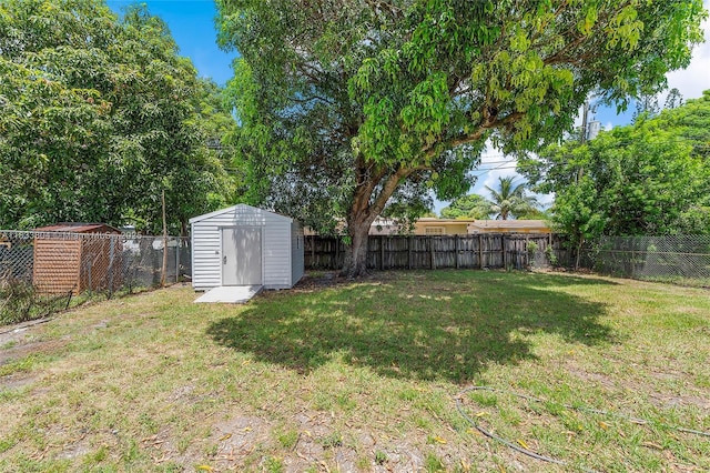 2050 NW 30th Ave, Fort Lauderdale, FL 33311 - fenced backyard featuring a storage unit