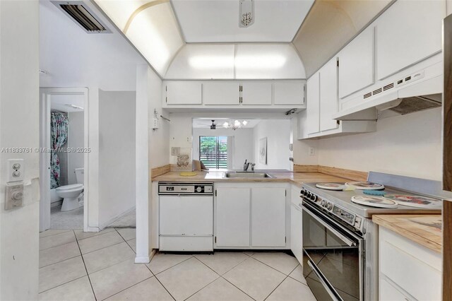 10304 Sunrise Lakes Blvd Unit 209, Sunrise, FL 33322 - kitchen with dishwasher, electric range oven, under cabinet range hood, light countertops, and light tile patterned flooring