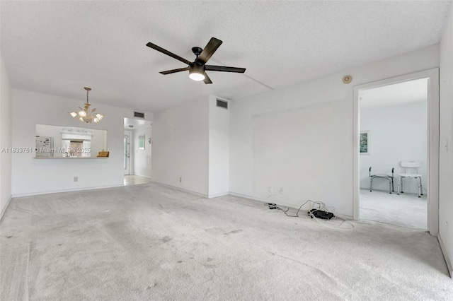 10304 Sunrise Lakes Blvd Unit 209, Sunrise, FL 33322 - unfurnished living room with a chandelier, carpet floors, ceiling fan, and a textured ceiling