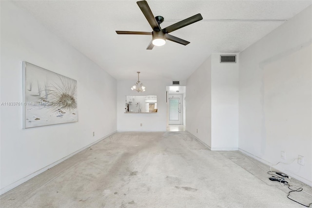 10304 Sunrise Lakes Blvd Unit 209, Sunrise, FL 33322 - unfurnished living room with a ceiling fan, a chandelier, and carpet flooring