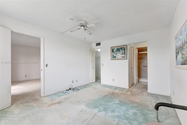 10304 Sunrise Lakes Blvd Unit 209, Sunrise, FL 33322 - unfurnished bedroom with carpet, a textured ceiling, ceiling fan, a spacious closet, and ensuite bathroom