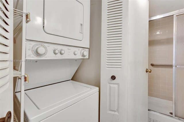 10304 Sunrise Lakes Blvd Unit 209, Sunrise, FL 33322 - laundry area featuring stacked washer / dryer