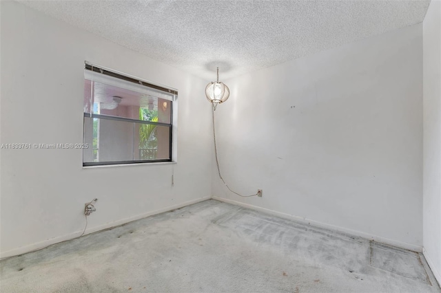 10304 Sunrise Lakes Blvd Unit 209, Sunrise, FL 33322 - unfurnished room featuring a textured ceiling and carpet floors
