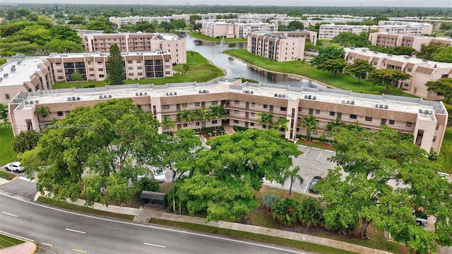 10304 Sunrise Lakes Blvd Unit 209, Sunrise, FL 33322 - drone / aerial view of apartment complex / building and a large body of water