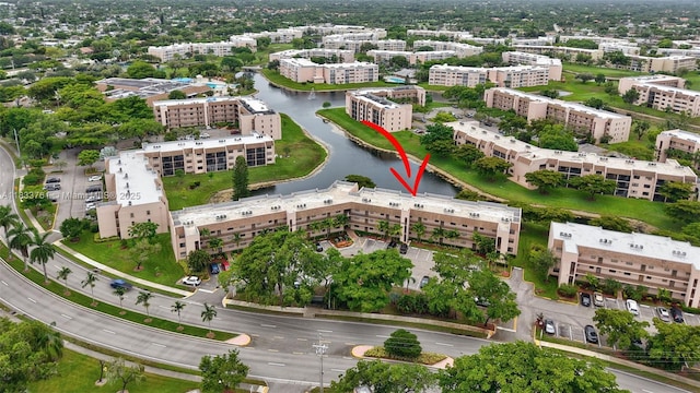 10304 Sunrise Lakes Blvd Unit 209, Sunrise, FL 33322 - drone / aerial view of a nearby body of water and apartment complex