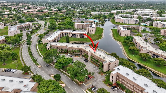 10304 Sunrise Lakes Blvd Unit 209, Sunrise, FL 33322 - view of urban area featuring a nearby body of water and apartment complex / building