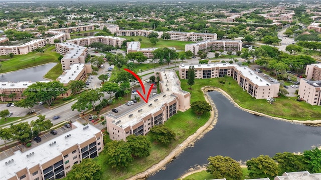 10304 Sunrise Lakes Blvd Unit 209, Sunrise, FL 33322 - drone / aerial view of a nearby body of water and apartment complex / building