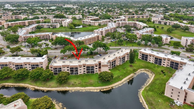 10304 Sunrise Lakes Blvd Unit 209, Sunrise, FL 33322 - drone / aerial view of a large body of water and apartment complex / building