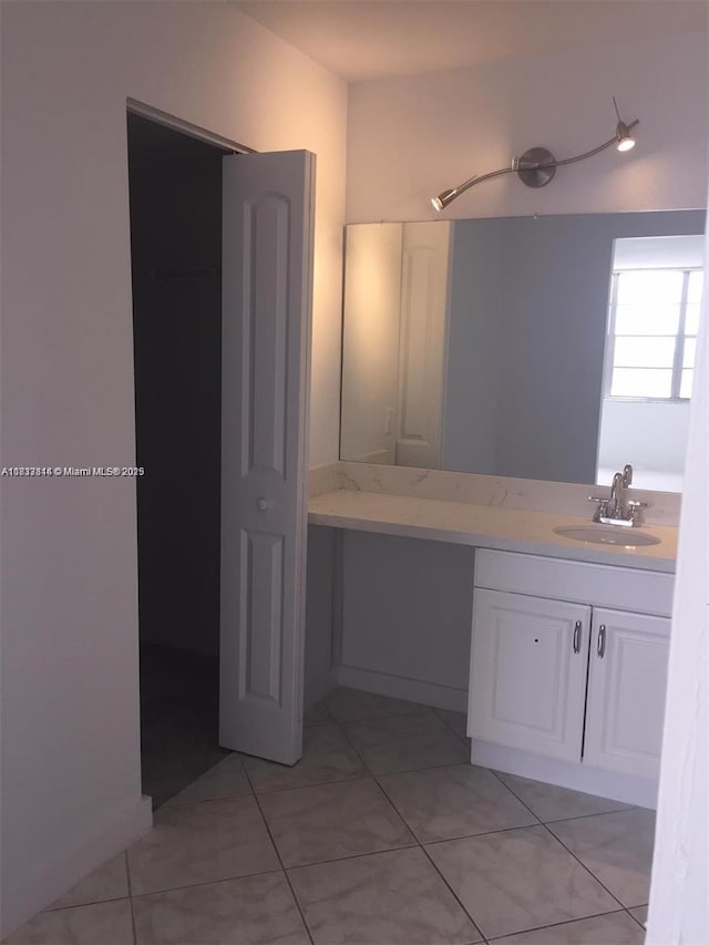 2025 NE 164th St Unit 516, North Miami Beach, FL 33162 - bathroom with vanity and tile patterned floors