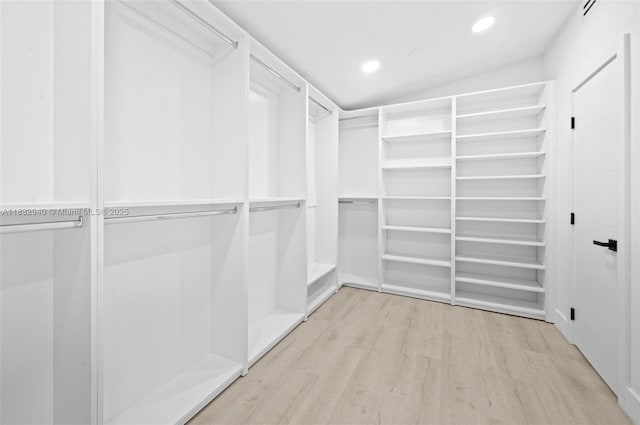 8250 SW 187th St, Cutler Bay, FL 33157 - spacious closet with light wood finished floors and vaulted ceiling