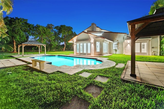 8250 SW 187th St, Cutler Bay, FL 33157 - outdoor pool with a gazebo, a lawn, an outbuilding, a storage structure, and a patio