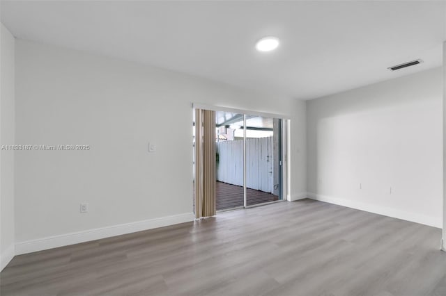 6514 SW 128th Pl Unit 6514, Miami, FL 33183 - spare room with wood finished floors and baseboards