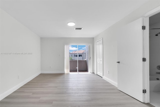 6514 SW 128th Pl Unit 6514, Miami, FL 33183 - spare room featuring light wood-type flooring and baseboards