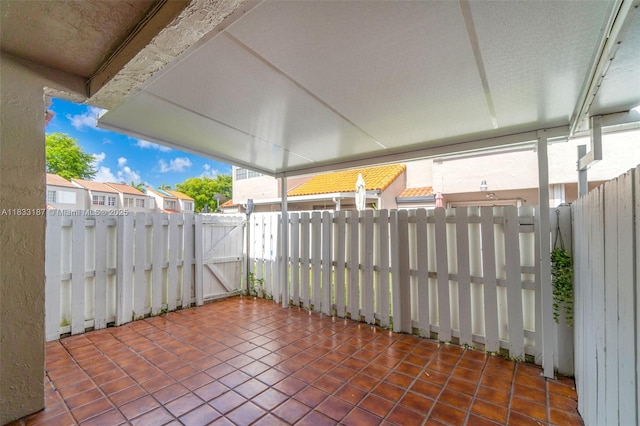 6514 SW 128th Pl Unit 6514, Miami, FL 33183 - view of patio featuring a gate