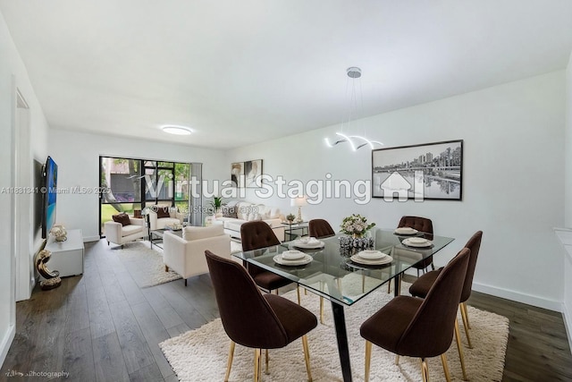 37 Seville Cir Unit 1-50, Davie, FL 33324 - dining space featuring dark wood-style flooring and baseboards