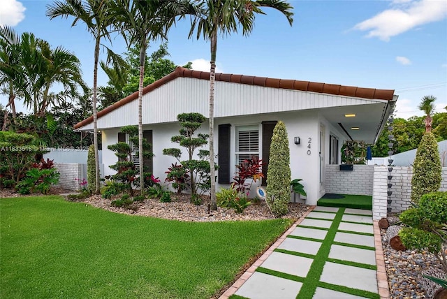 240 NE 97th St, Miami Shores, FL 33138 - view of front facade featuring stucco siding