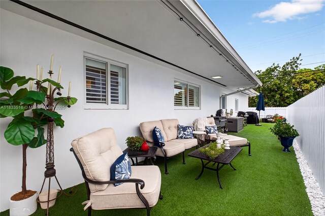 240 NE 97th St, Miami Shores, FL 33138 - fenced backyard featuring an outdoor hangout area