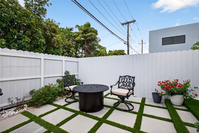 240 NE 97th St, Miami Shores, FL 33138 - fenced backyard with a patio area