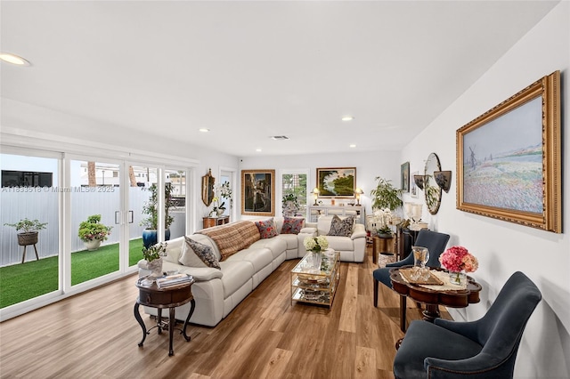 240 NE 97th St, Miami Shores, FL 33138 - living room with wood finished floors and recessed lighting
