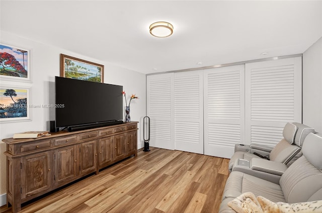 240 NE 97th St, Miami Shores, FL 33138 - living room with light wood-style flooring
