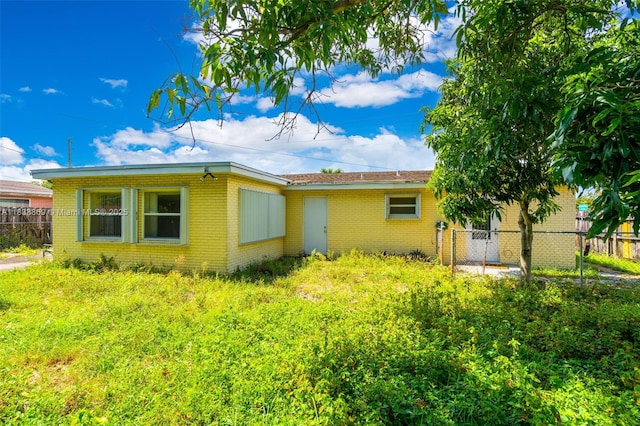 2727 Hypoluxo Rd, Boynton Beach, FL 33462 - view of side of home with brick siding
