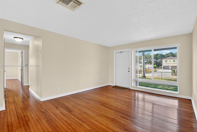 4061 Nova Ln, Lake Worth, FL 33462 - unfurnished room with baseboards and wood-type flooring