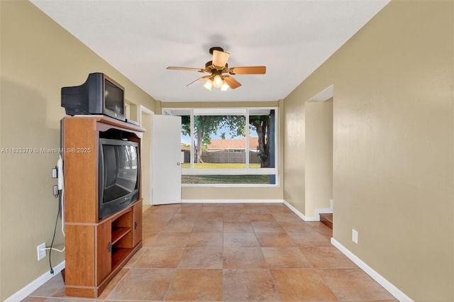 4061 Nova Ln, Lake Worth, FL 33462 - unfurnished living room featuring ceiling fan and baseboards