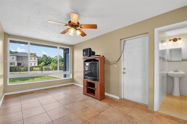4061 Nova Ln, Lake Worth, FL 33462 - unfurnished living room featuring light tile patterned floors and a ceiling fan