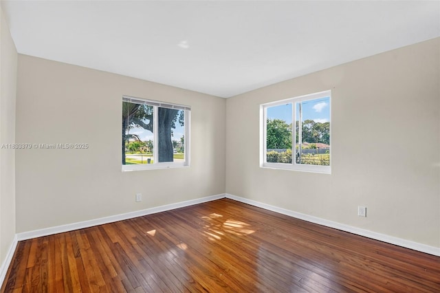 4061 Nova Ln, Lake Worth, FL 33462 - spare room with healthy amount of natural light and wood-type flooring