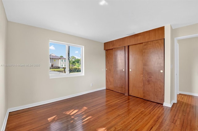4061 Nova Ln, Lake Worth, FL 33462 - unfurnished bedroom featuring hardwood / wood-style flooring and a closet