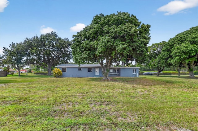 4061 Nova Ln, Lake Worth, FL 33462 - view of front of house with a front lawn