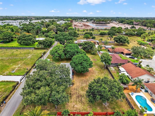 4061 Nova Ln, Lake Worth, FL 33462 - bird's eye view of a pool and a tree filled landscape