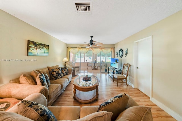 841 Meadowlark Ln, Delray Beach, FL 33445 - living area featuring ceiling fan and wood finished floors