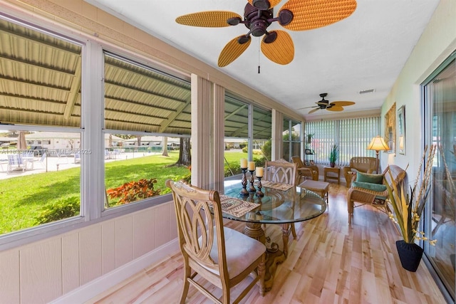 841 Meadowlark Ln, Delray Beach, FL 33445 - sunroom featuring wood finished floors, ceiling fan, and plenty of natural light