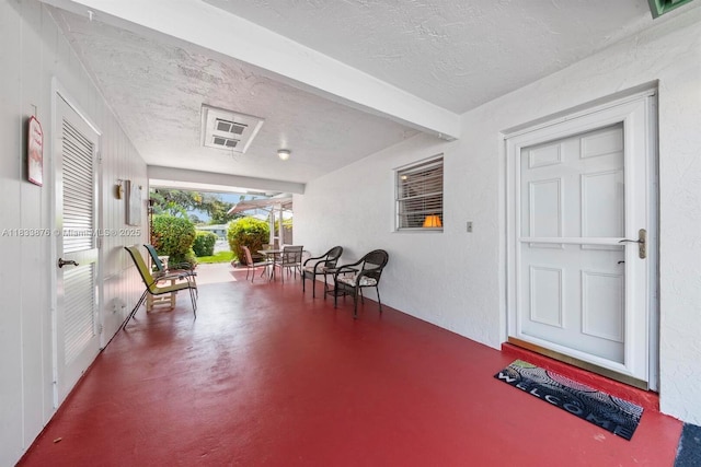 841 Meadowlark Ln, Delray Beach, FL 33445 - doorway to property featuring covered porch