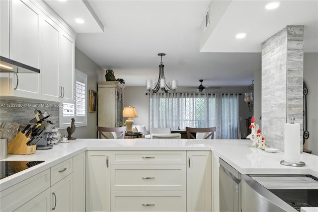 1651 SW 127th Ave Unit 301A, Pembroke Pines, FL 33027 - kitchen with a peninsula, a ceiling fan, range hood, white cabinets, and recessed lighting