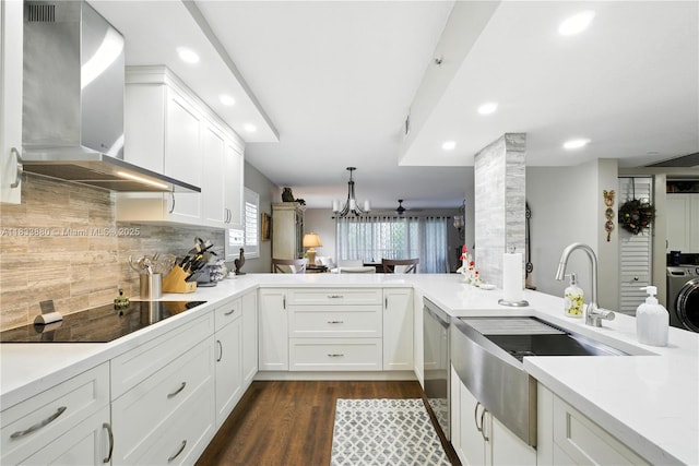 1651 SW 127th Ave Unit 301A, Pembroke Pines, FL 33027 - kitchen featuring wall chimney exhaust hood, recessed lighting, black electric cooktop, tasteful backsplash, and dark wood finished floors
