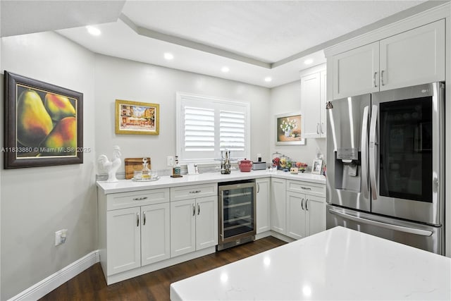 1651 SW 127th Ave Unit 301A, Pembroke Pines, FL 33027 - kitchen with stainless steel refrigerator with ice dispenser, wine cooler, recessed lighting, dark wood finished floors, and light countertops