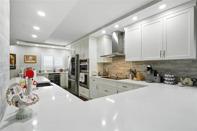 1651 SW 127th Ave Unit 301A, Pembroke Pines, FL 33027 - kitchen featuring wall chimney exhaust hood, wine cooler, recessed lighting, appliances with stainless steel finishes, and light countertops