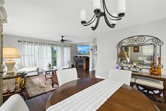 1651 SW 127th Ave Unit 301A, Pembroke Pines, FL 33027 - dining room featuring wood finished floors, plenty of natural light, and a glass covered fireplace